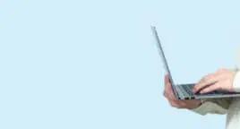 man with a laptop ready to audit their business electricals